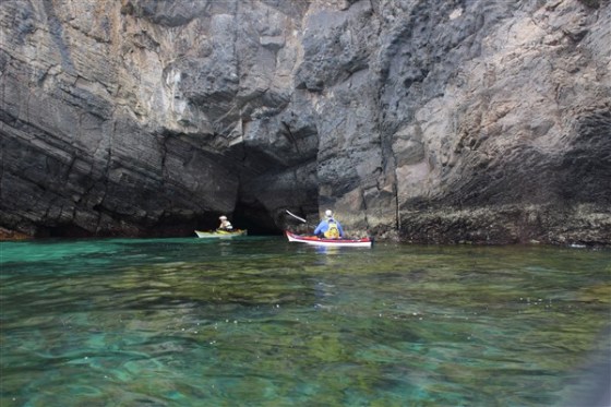 Clear water and steep cliffs